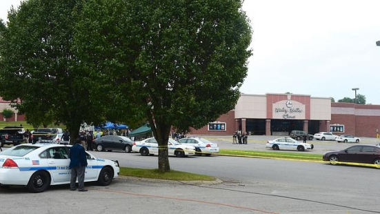 ANTIOCH, TN - AUGUST 05: Police work outside Hickory Hollow Cinemas after an unidentified gunman was shot dead on August 5, 2015 in Antioch, Tennessee. According to reports, an unidentified 51-year-old man armed with a gun and hatchet sprayed three people with a chemical believed to be pepper spray and injured another with a minor wound from the hatchet. The man was later killed by police after exchanging fire outside the theater.   Jason Davis/Getty Images/AFP == FOR NEWSPAPERS, INTERNET, TELCOS & TELEVISION USE ONLY ==